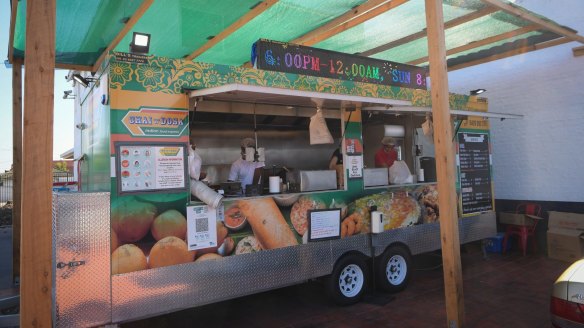 Chai 'n' Dosa food truck is parked in an ex-car lot in Braybrook.