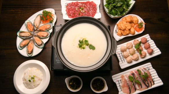 Shunde-style porridge base hotpot with seafood, sliced beef and delicate fish and pork balls. 
