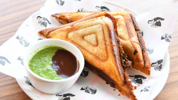 Paneer tikka jaffle with mint and tamarind chutney.