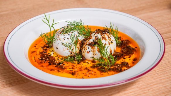 Standing Room's cilbir eggs with labne and Aleppo butter.