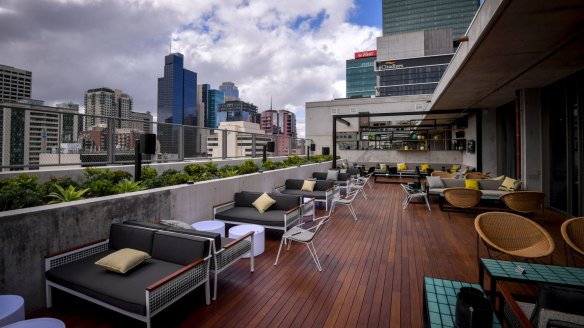 With oiled decking and beachy touches, The Rooftop at QT almost has a (whisper it) Sydney vibe.