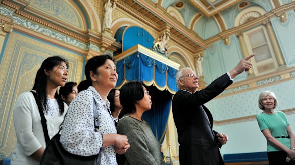 Alex Chernov, Governor of Victoria, and his wife, Elizabeth, meet students from Kew Neighbourhood Learning Centre during their tour of Government House in December 2012.