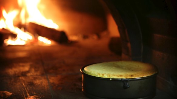 A baked cheescake in the wood-fired oven.