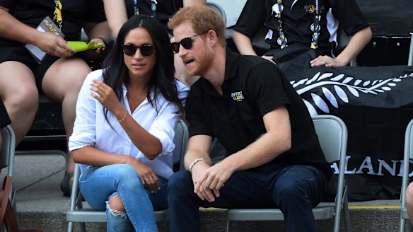 Prince Harry and his girlfriend Meghan Markle attend a wheelchair tennis event at the Invictus Games in Toronto, Monday, Sept. 25, 2017.