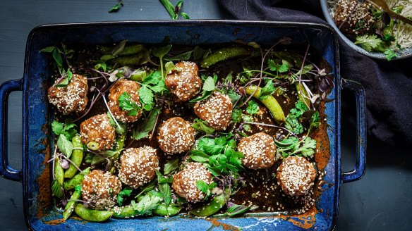 Quick sticky sesame lemongrass pork meatball traybake. Summer traybake recipes and sheetpan dinners for Good Food, January 2020. Images and recipes by KatrinaÃÂ Meynink. Good Food use only. One tray wonders.