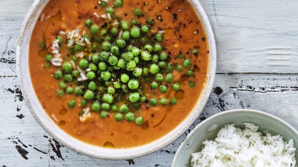 A humble bag of frozen peas adds freshness to this pantry braise.