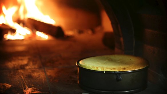 Even the baked cheescake gets the wood-fire treatment at Ortzi.