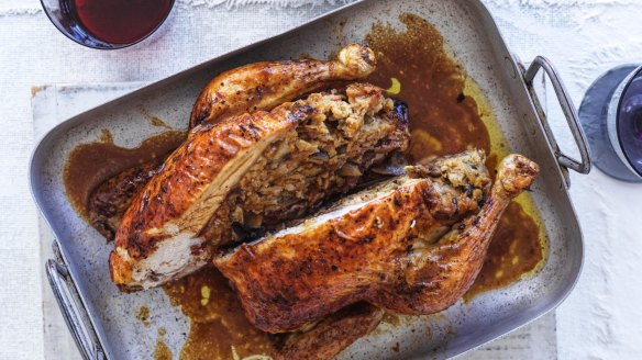 Roast chicken with bacon and mushroom stuffing and red wine gravy.