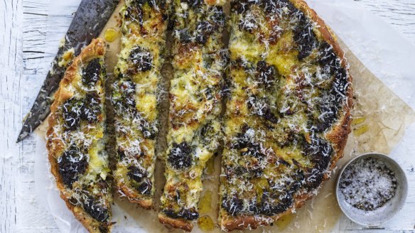 Broccoli tart with caramelised onion and plenty of cheese.
