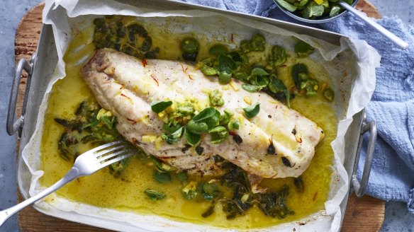Baked fish with saffron butter, lemon and green olive salsa.