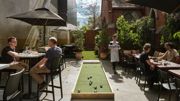 Pasta Poetry's courtyard, complete with a bocce green.