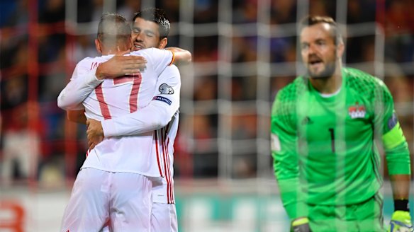 Spain's Iago Aspas and Isco celebrate after Aspas scored his side's fifth goal against Liechtenstein.