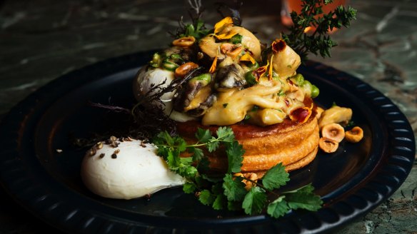 Wild mushroom feuillete with sheep's curd, spinach, peas, poached egg and hazelnut.