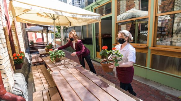 Pepe's Italian & Liquor in Melbourne's CBD setting up a brand-new outdoor area in preparation for dining to reopen.
