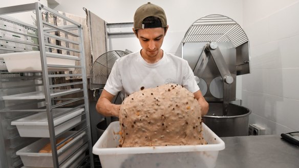 Matias Ferrari baking hot cross buns at To Be Frank in Collingwood. 