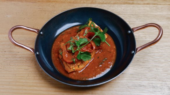 Snapper in a red pepper and coriander sauce.