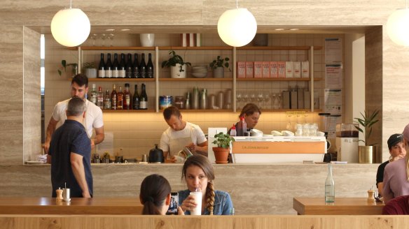 Bright whites and light woods fill the 1930s foreshore building. 