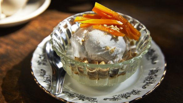 Coconut ice-cream with peanuts, candied pumpkin and palm seeds.