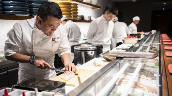 Chefs at the sushi counter at Nobu, Crown Sydney.