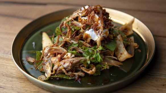 Salad of quail, roasted chilli, banana blossoms and sesame seeds.