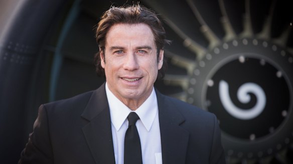 John Travolta was on hand as Qantas took delivery of the seventies themed aircraft.