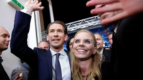 Sebastian Kurz, leader of the People's Party (OeVP), and his girlfriend Susanne Thier celebrate victory in Vienna on Sunday.