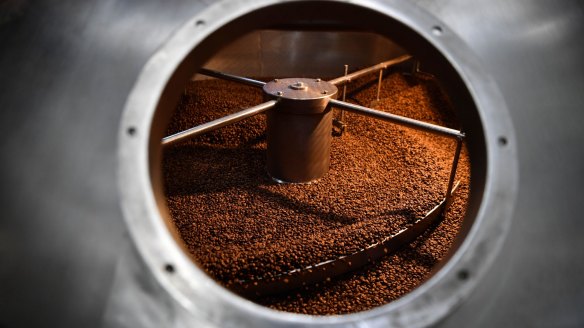 Coffee being ground at Griffths Bros coffee roasters.