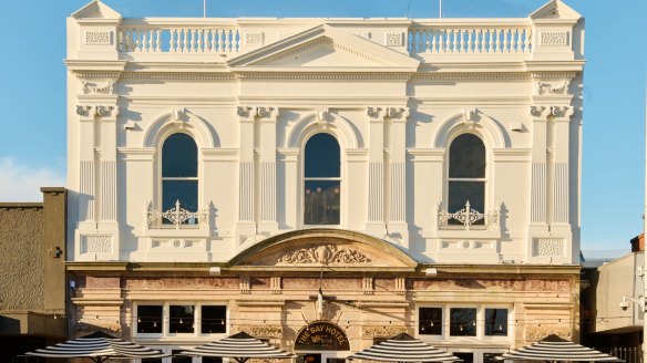 The building was originally a bank, and its vault is now a private dining room.