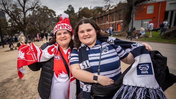 Swans and Cats fans attend the AFL Grand Final parade 