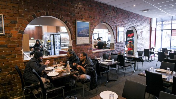 The simple red brick dining room. 