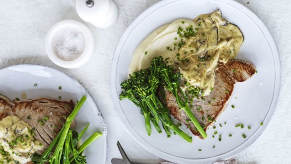 Seared tuna steak with creamy mushroom sauce.