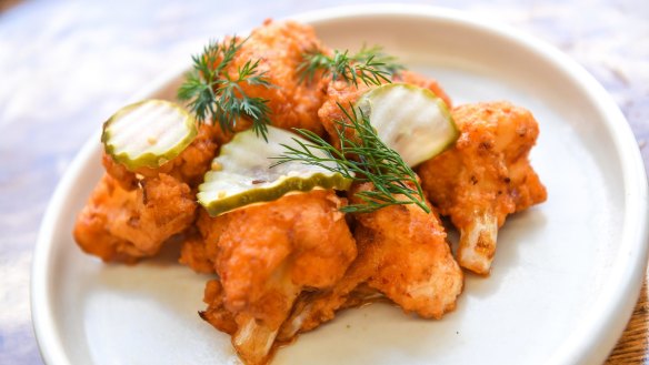 Go-to snack: Deep-fried buffalo cauliflower with chipotle butter and pickles.