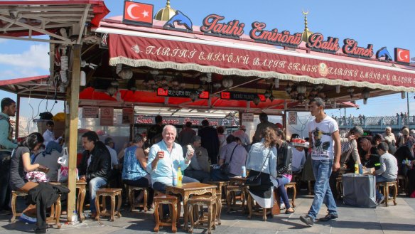 Rick Stein eating Istanbul's famous fish sandwich, balik ekmek, in his TV series 'Rick Stein: From Venice to Istanbul'.