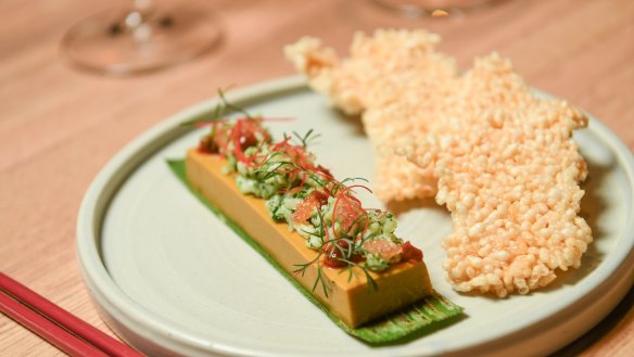 Nguyen's play on otak otak is a coconutty curried crab parfait.