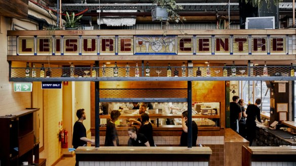 The retro design features bowling and bar-themed leadlight panels.