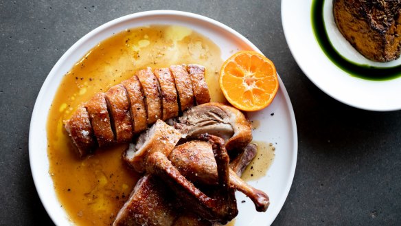 Wood-roasted half duck with burnt butter and mandarin is the go-to dish (roast pumpkin with coriander oil also pictured, top right).