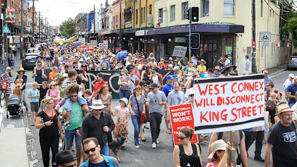 Concerned residents take to the streets of Newtown, Sydney, to protest the proposed development of the NSW government's WestConnex tunnel and road project.