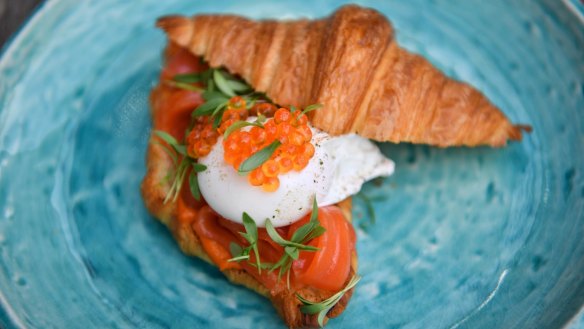 Croissant with cured trout, roe and poached egg.