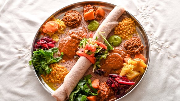 Omnivore combination platter on injera bread.