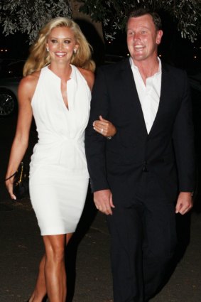 Anthony Bell and Kelly Landry arrive at Catalina Restaurant in February 2011 for their surprise wedding party.
