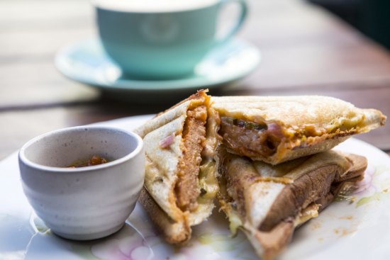 A vegan sausage and sauerkraut jaffle at social enterprise cafe Home.Two.