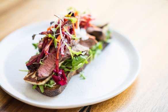 Lamb and haloumi open rye with beetroot slaw.