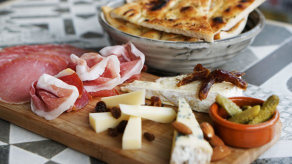 Start with a bang: try the antipasto board at Salt Meats Cheese.