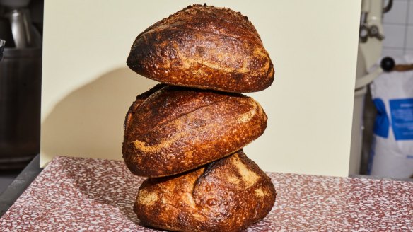 A stack of spelt loaves from A.P. House by All Purpose Bakery.
