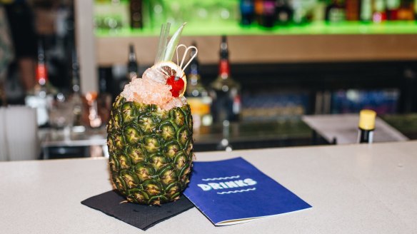 Cocktails include drinks served in coconuts or pineapples.