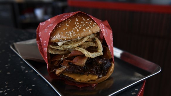 The Epic Flave Burger, a big fat sauce-dripping cheeseburger. 