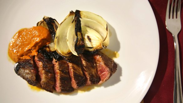 Skirt steak and charred onions.