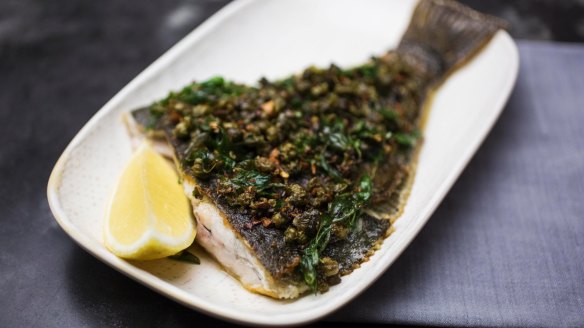 Whole yellow belly flounder with caper, garlic and chilli crust.