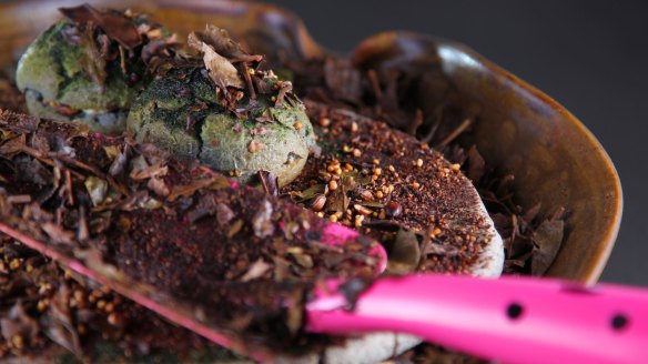 Zaiyu Hasegawa serves a quirky dessert on a shovel at his restaurant.