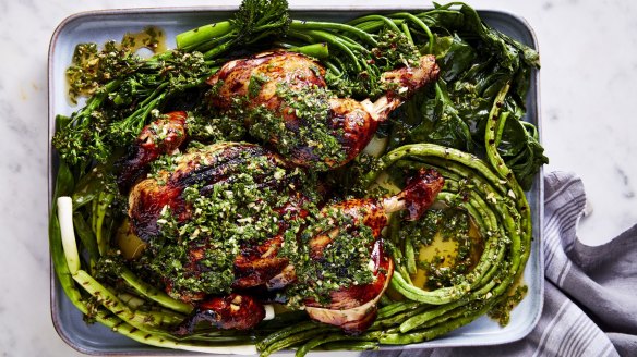 Barbecued chicken with charred greens and chimichurri.